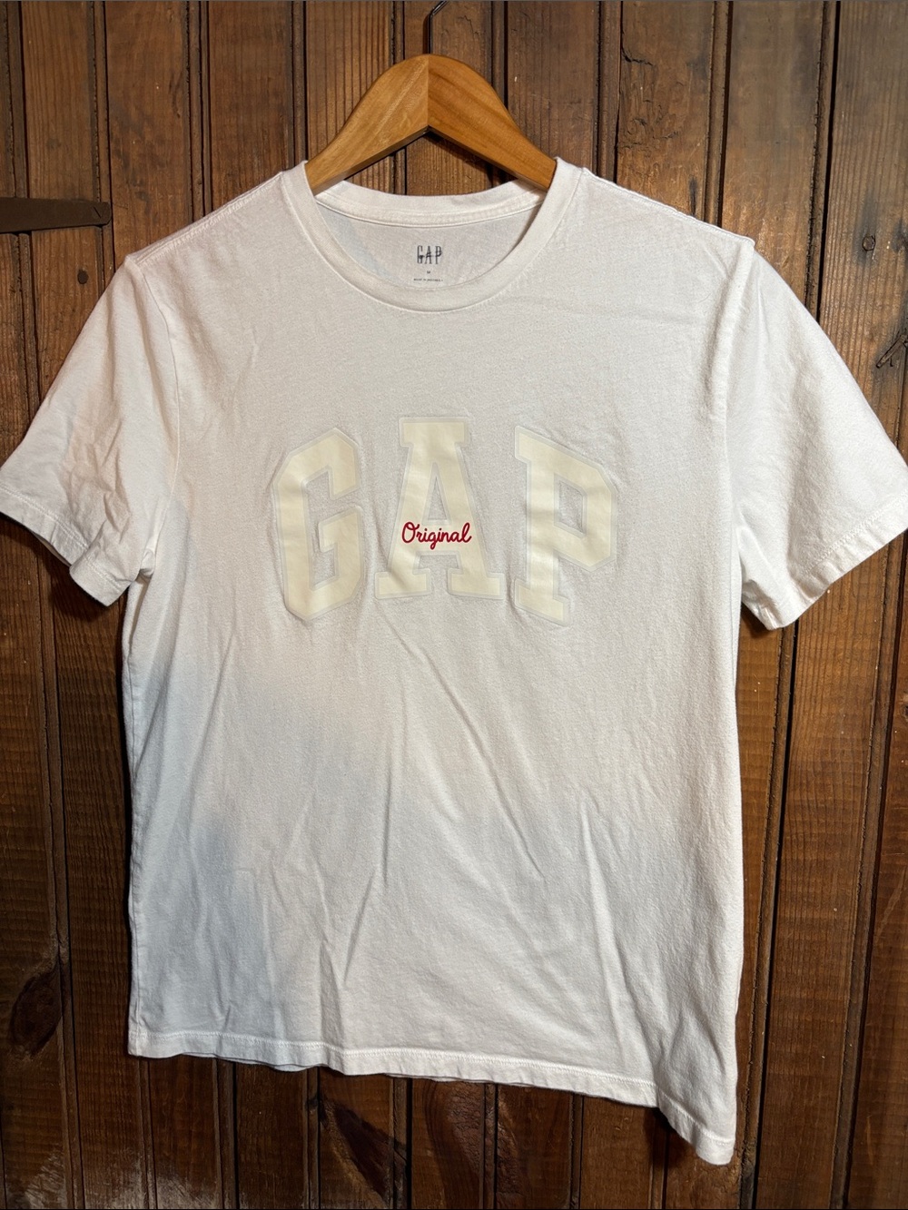 GAP White Tee with Cream Appliqué and Red Script